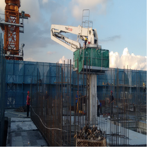 What are the preparations before the use of TRUEMAX hydraulic concrete placing boom?